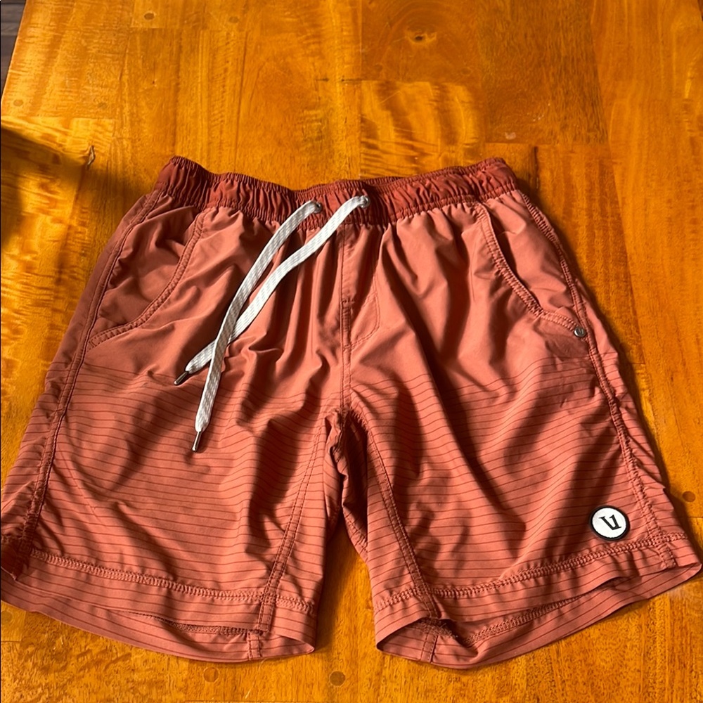Vuori Men's Athletic Shorts in Rust